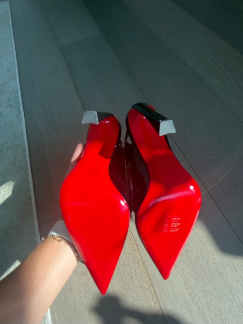 Christian Louboutin Black Patent Slingback Pumps with Red Sole